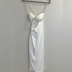 Silky with dress with cut out, and rhinestone trim